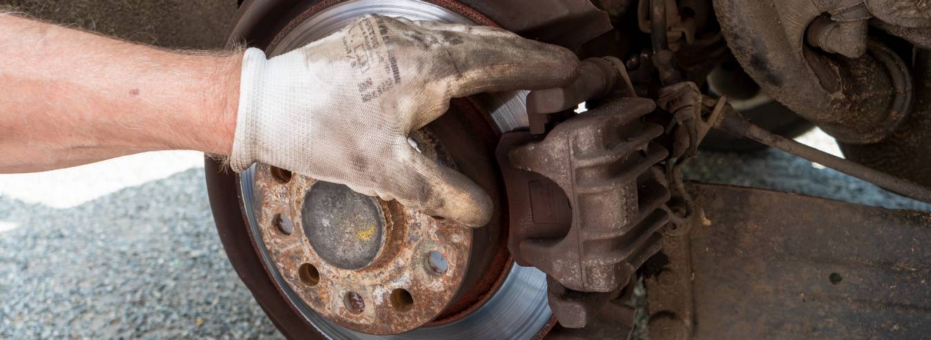 car-mechanic-repairing-brakes